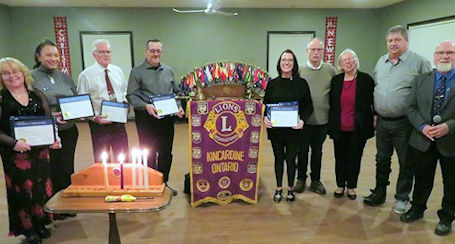 Kincardine Lions welcome new members, receive donation from Blues Festival