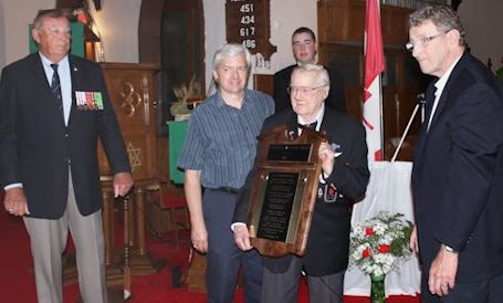 Charles Mann receives plaque of honour at Anglican Church of the Messiah