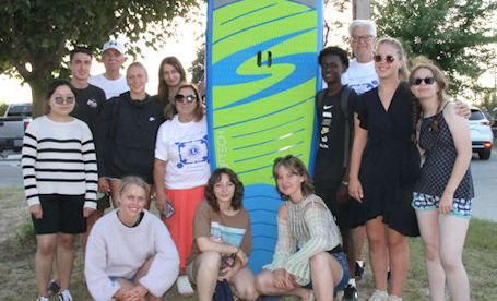 Kincardine Lions exchange students go paddle-boarding at sunset