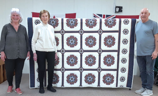 Long-time Huron Lakeshore Friendship Club member donates quilt for fund-raiser
