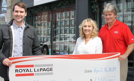 Battlers donate $1,250 to Huron Shores Hospice