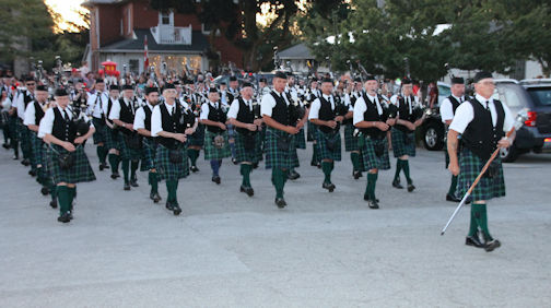 Kincardine Scottish Pipe Band shines in the dark at final Saturday Night Parade