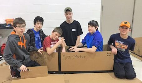 Huron Heights students test their skills at cardboard boat races